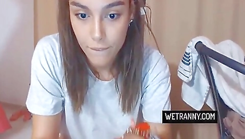 Busty shemale show her tattooed body in a solo movie